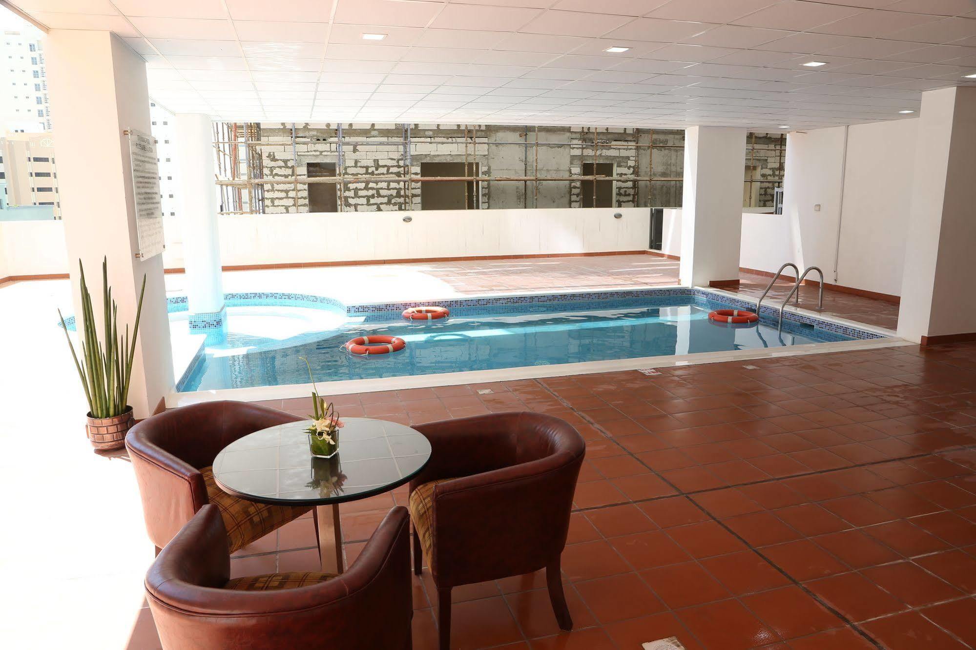 מנאמה Belle Tower Luxury Apartments מראה חיצוני תמונה