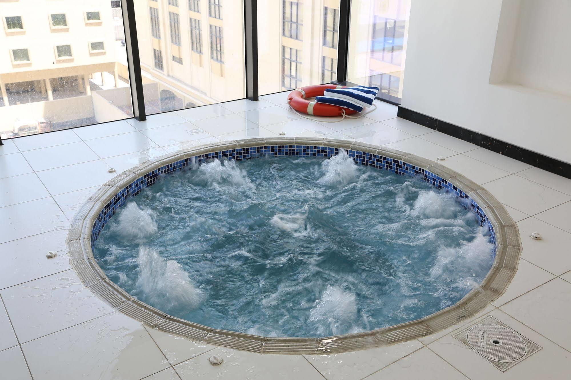 מנאמה Belle Tower Luxury Apartments מראה חיצוני תמונה