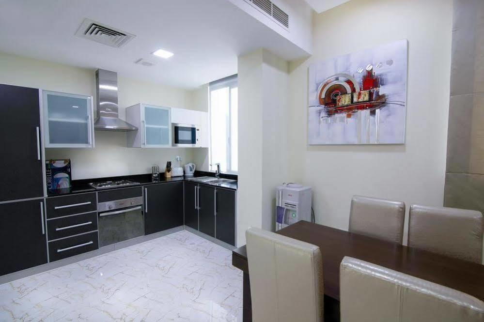 מנאמה Belle Tower Luxury Apartments מראה חיצוני תמונה